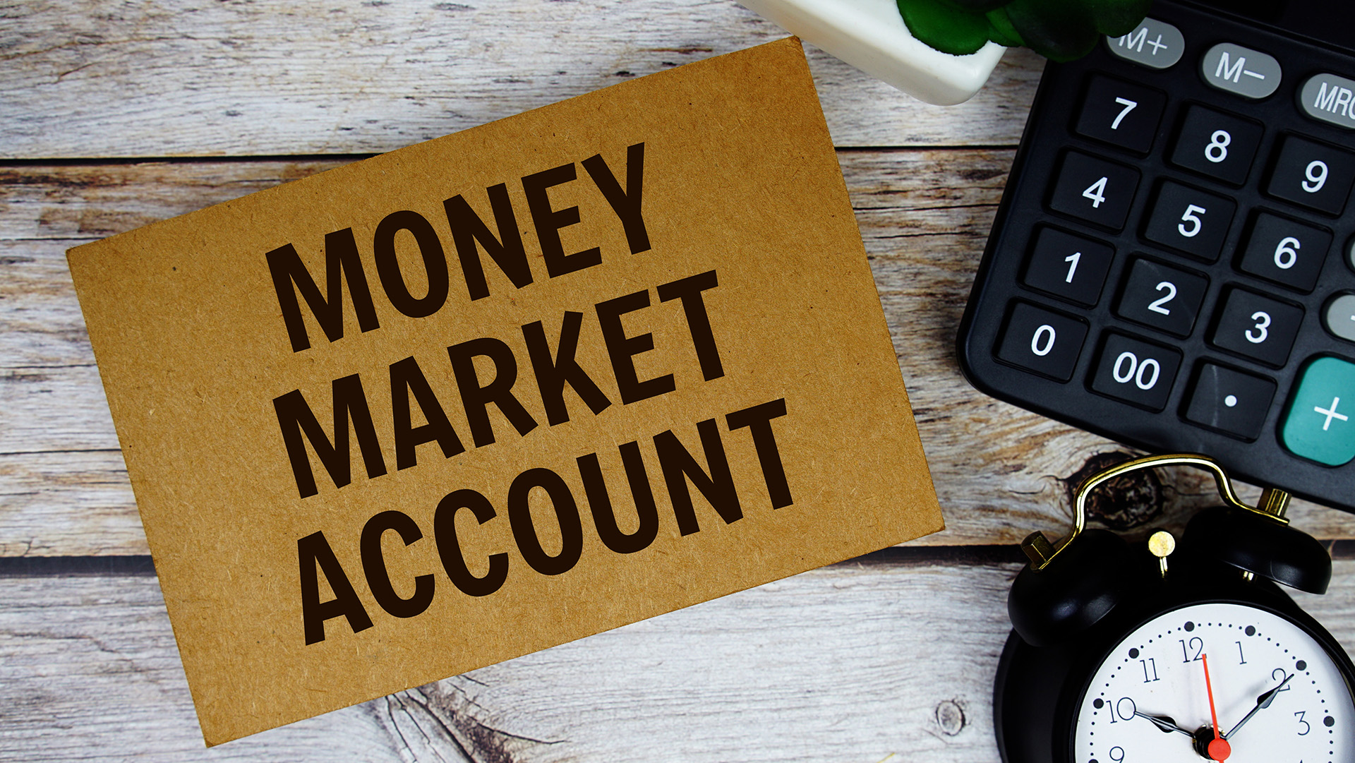 money market sign with clock and calculator